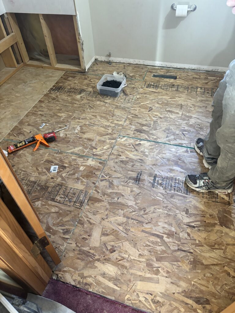 Water Damage On Bathroom Floor with Mold project photo 5